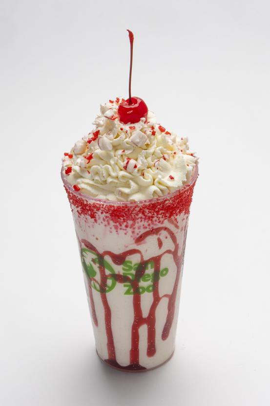 Shake with whipped cream and a cherry