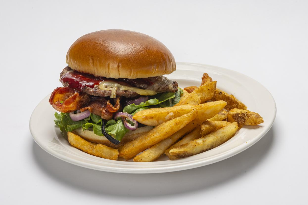 Hamburger with toppings and fries